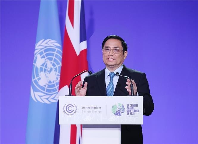 Thủ tướng Phạm Minh Chính phát biểu tại Hội nghị lần thứ 26 các bên tham gia Công ước khung của Liên hợp quốc về biến đổi khí hậu (COP26). Ảnh: Dương Giang/TTXVN 