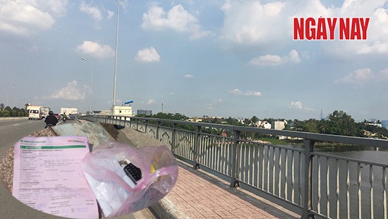 Cầu Phú Long - nơi anh Tâm để lại xe máy, đôi dép, ví tiền và hợp đồng vay nợ với FE CREDIT rồi nhảy xuống sông tự tử. Ảnh Linh Vũ