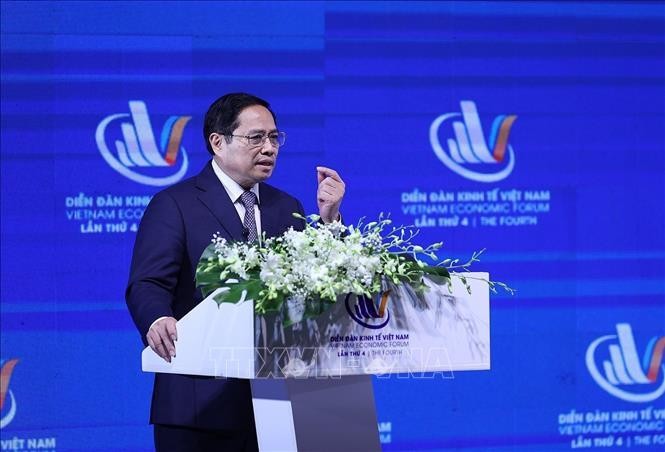 Thủ tướng Phạm Minh Chính phát biểu tại Diễn đàn Kinh tế Việt Nam lần thứ tư. Ảnh: TTXVN