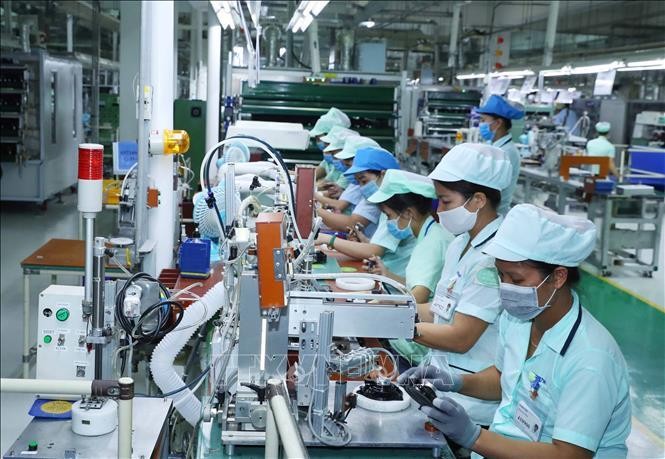 Sản xuất các loại loa và tai nghe điện thoại di động tại nhà máy của Công ty TNHH Điện tử Foster (Bắc Ninh), tại Khu Công nghiệp Đô thị và Dịch vụ VSIP Bắc Ninh, xã Phù Chẩn, thị xã Từ Sơn, tỉnh Bắc Ninh. Ảnh: Thống Nhất/TTXVN
