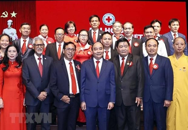 Chủ tịch nước Nguyễn Xuân Phúc với các đại biểu dự Đại hội. (Ảnh: Thống Nhất/TTXVN)